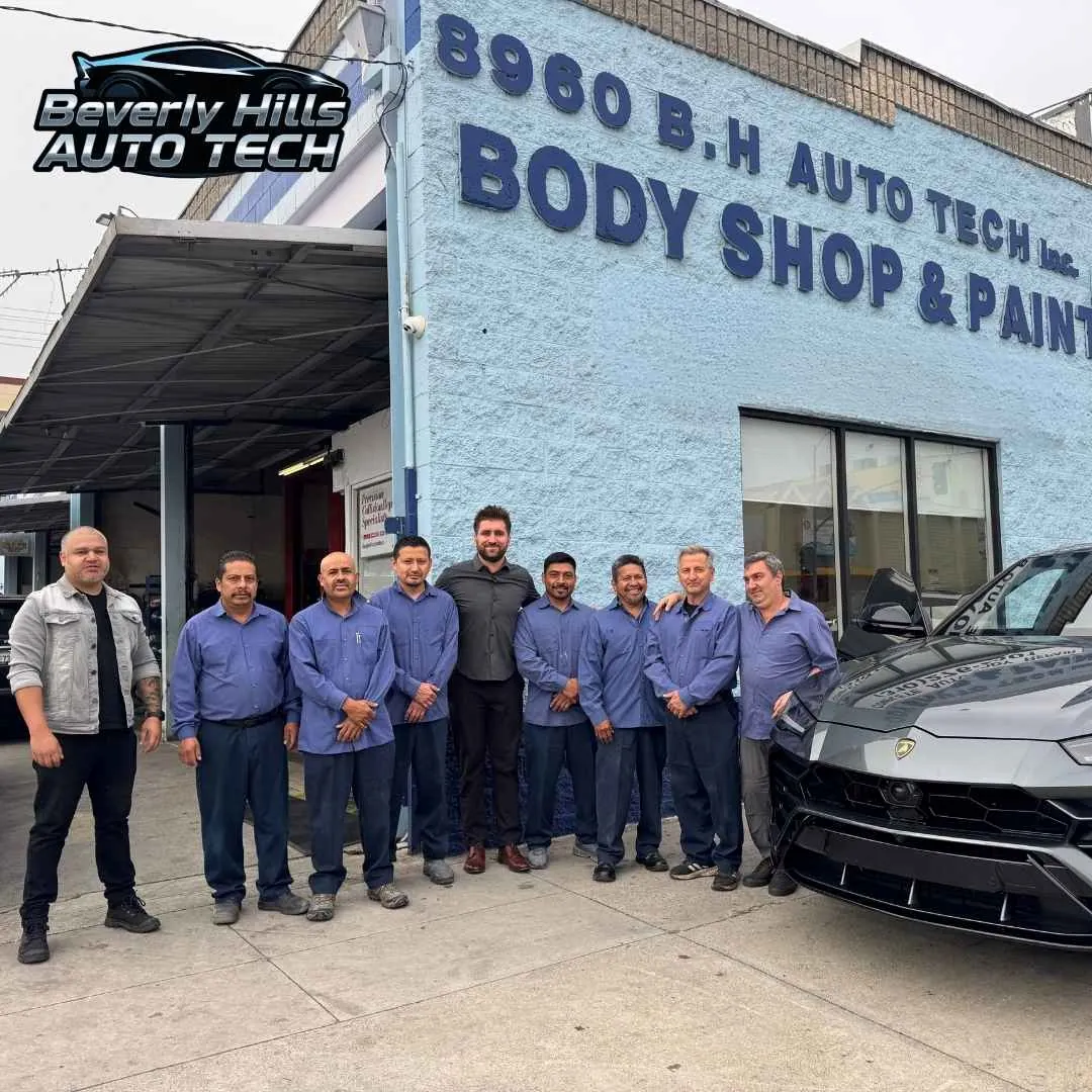 staff-image-front-auto-body-shop- Customer Picking Up a Car from the Auto Body Shop